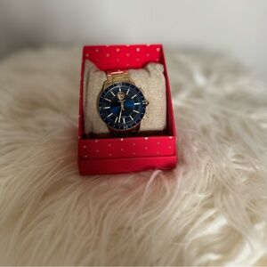 Gold Tory Burch ToryTrack Hybrid Smartwatch – Stylish & Smart